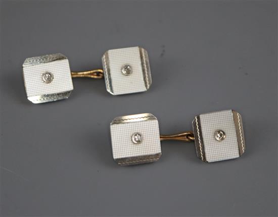 A pair of 9ct, 18ct and diamond set square cufflinks.